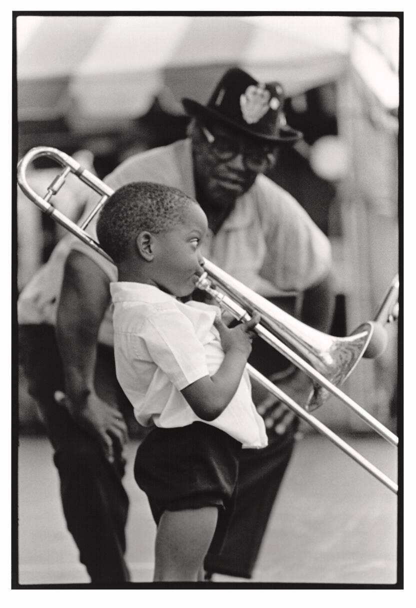 Trombone Shorty on stage with Bo Diddley, New Orleans Jazz and Heritage Festival